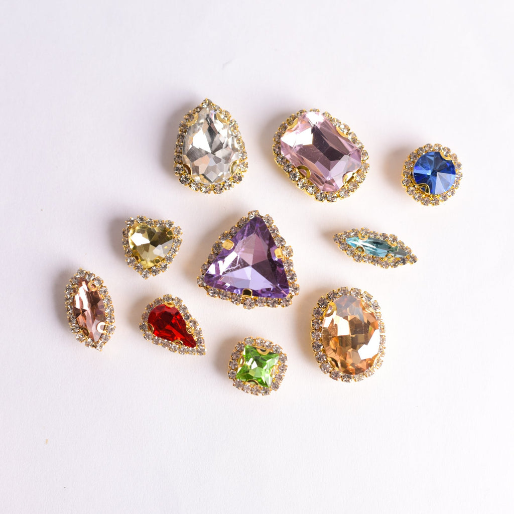 Assorted colorful gemstones on a white background