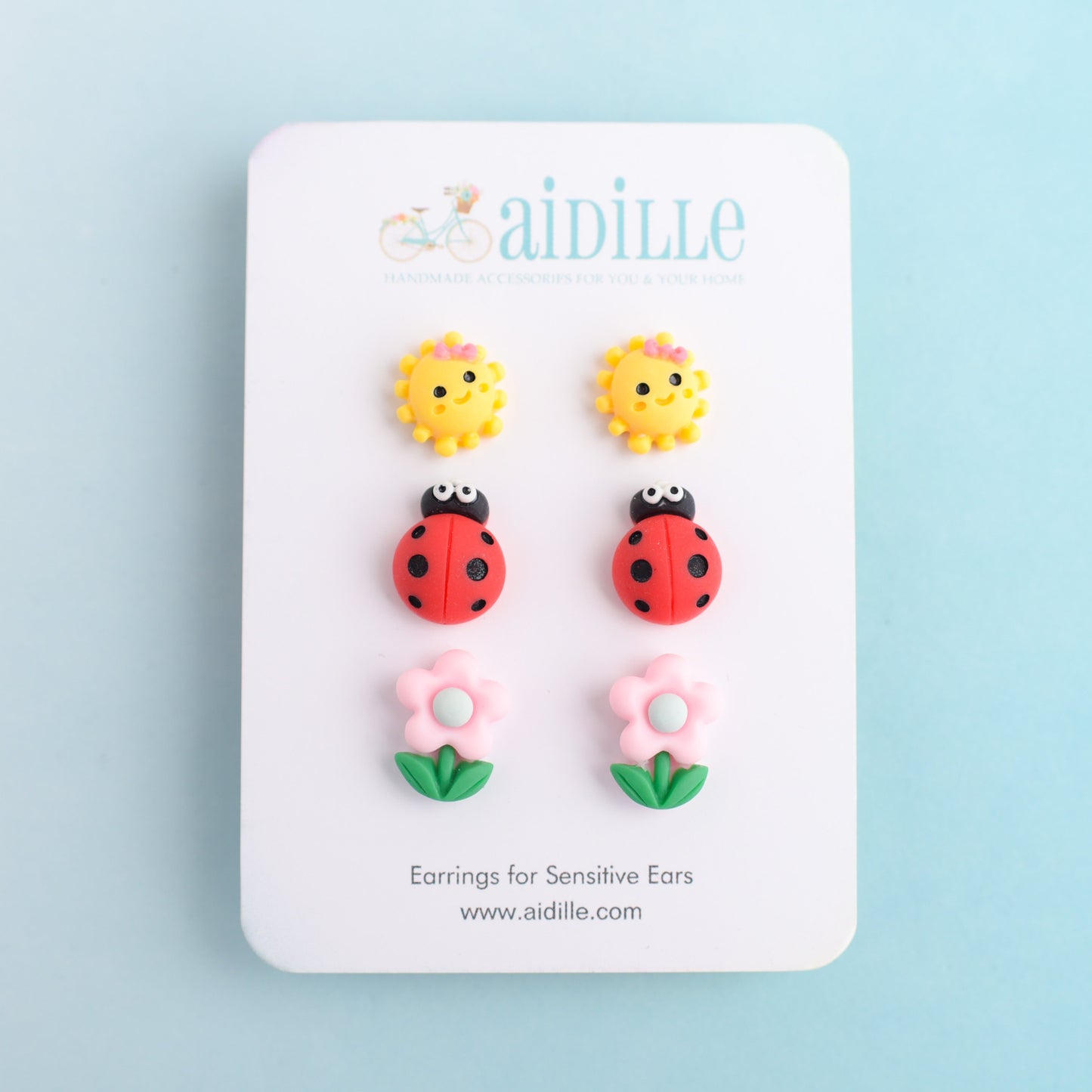 Ladybug, Sun, and Flower Spring Earring Trio with Titanium Posts