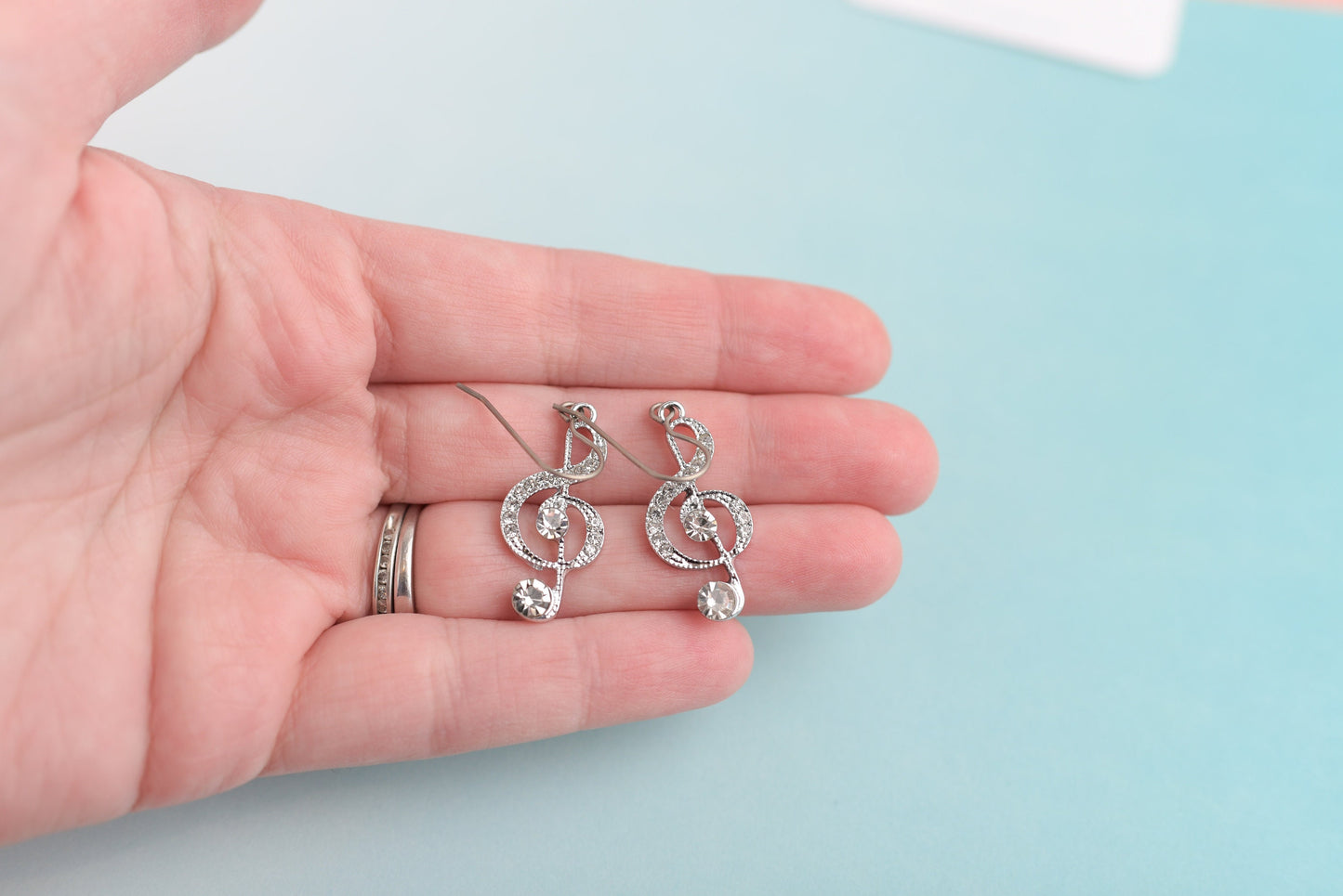 Sparkly Treble Clef Dangles with Titanium Ear Wires