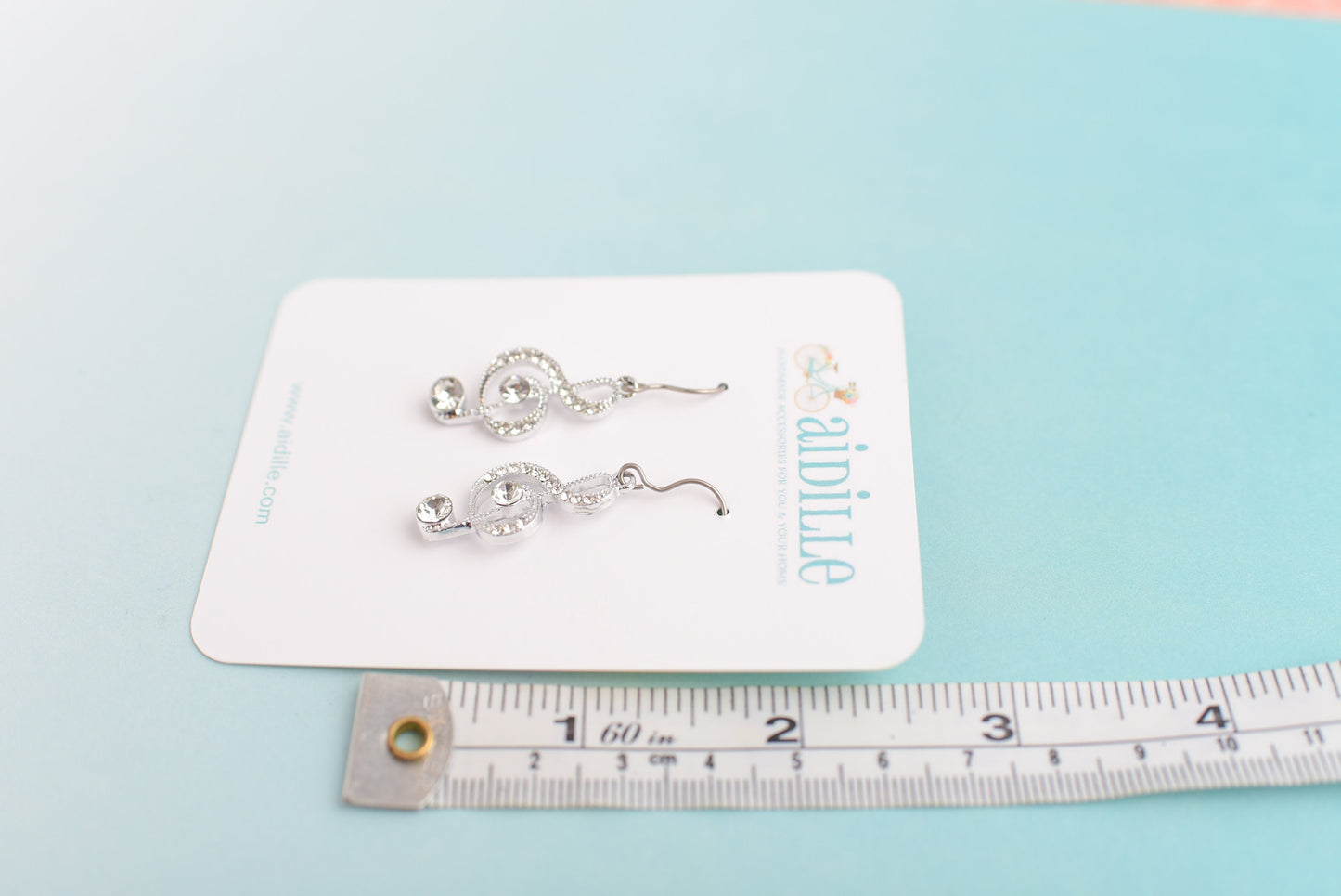 Sparkly Treble Clef Dangles with Titanium Ear Wires